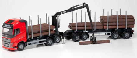 EMEK Volvo FH16 tukkirekka, punainen, ohjaamonosturilla.